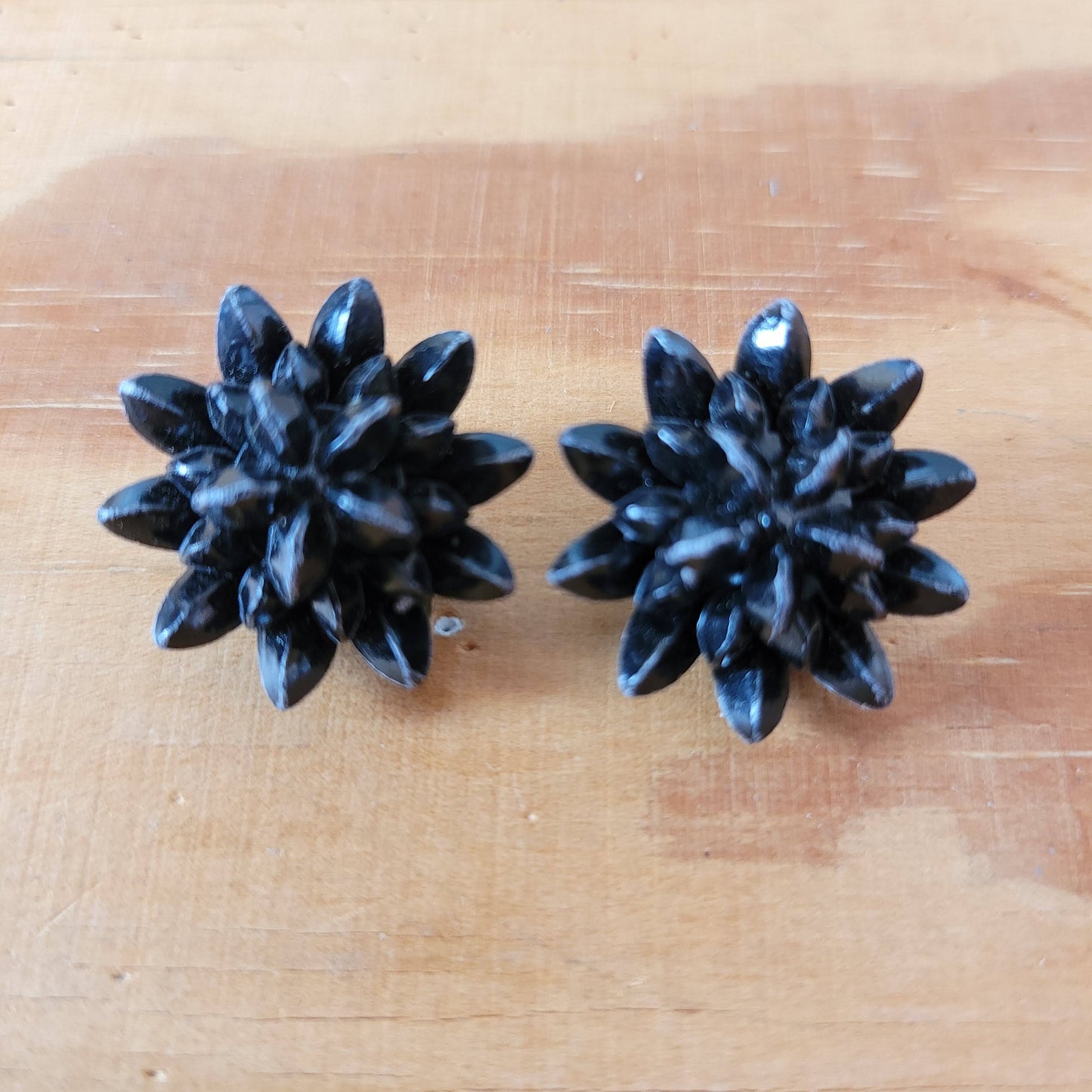 1950s black plastic three dimensional star-shaped clip-on earrings
