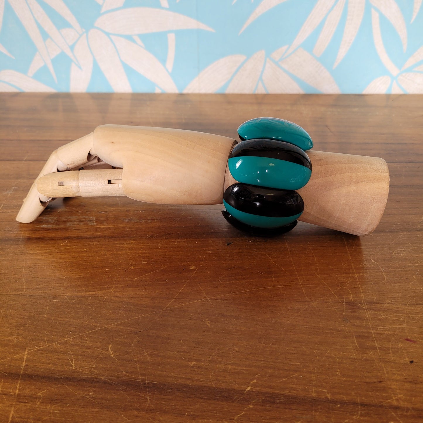 1980s-style statement two tone peacock green & black stretch bangle