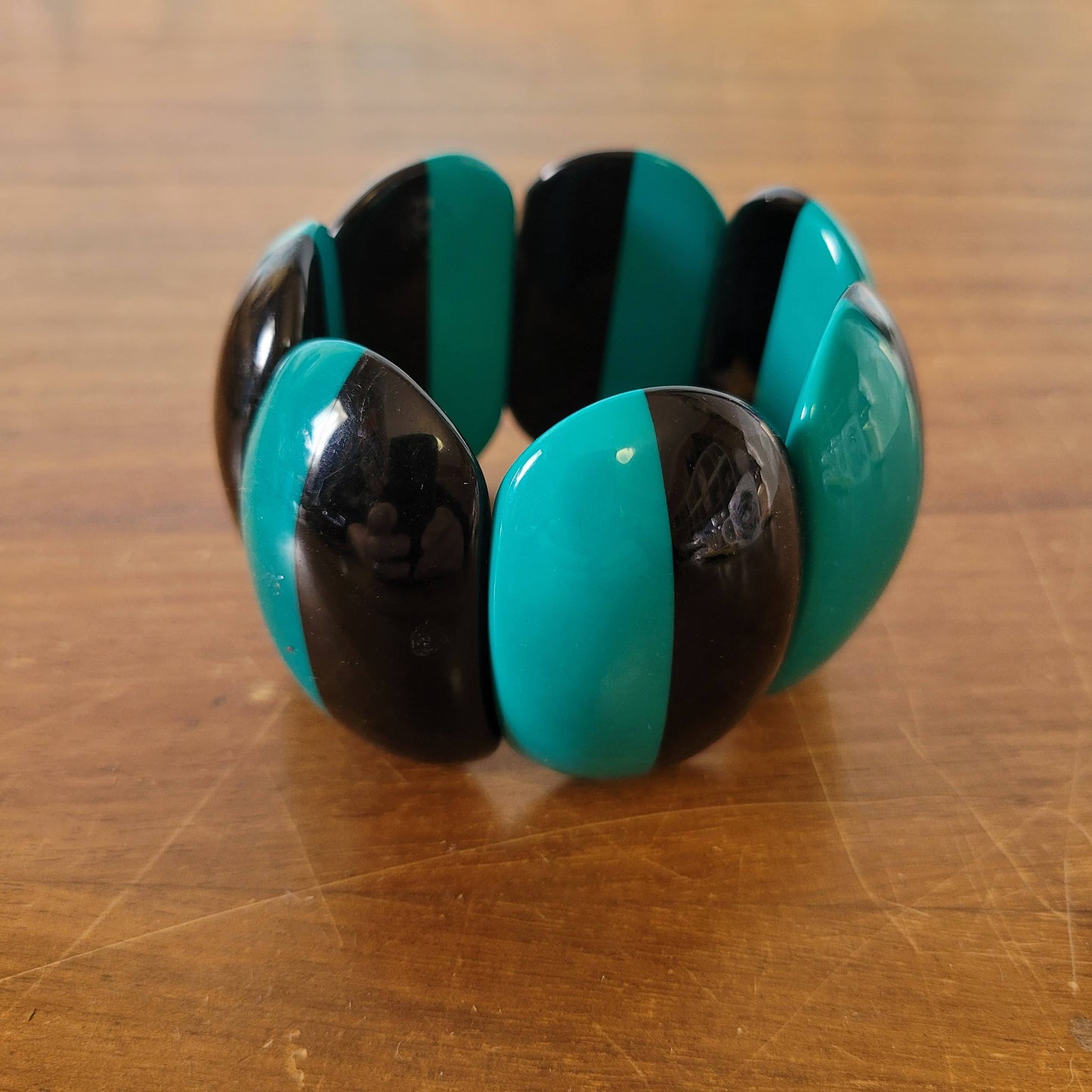 1980s-style statement two tone peacock green & black stretch bangle