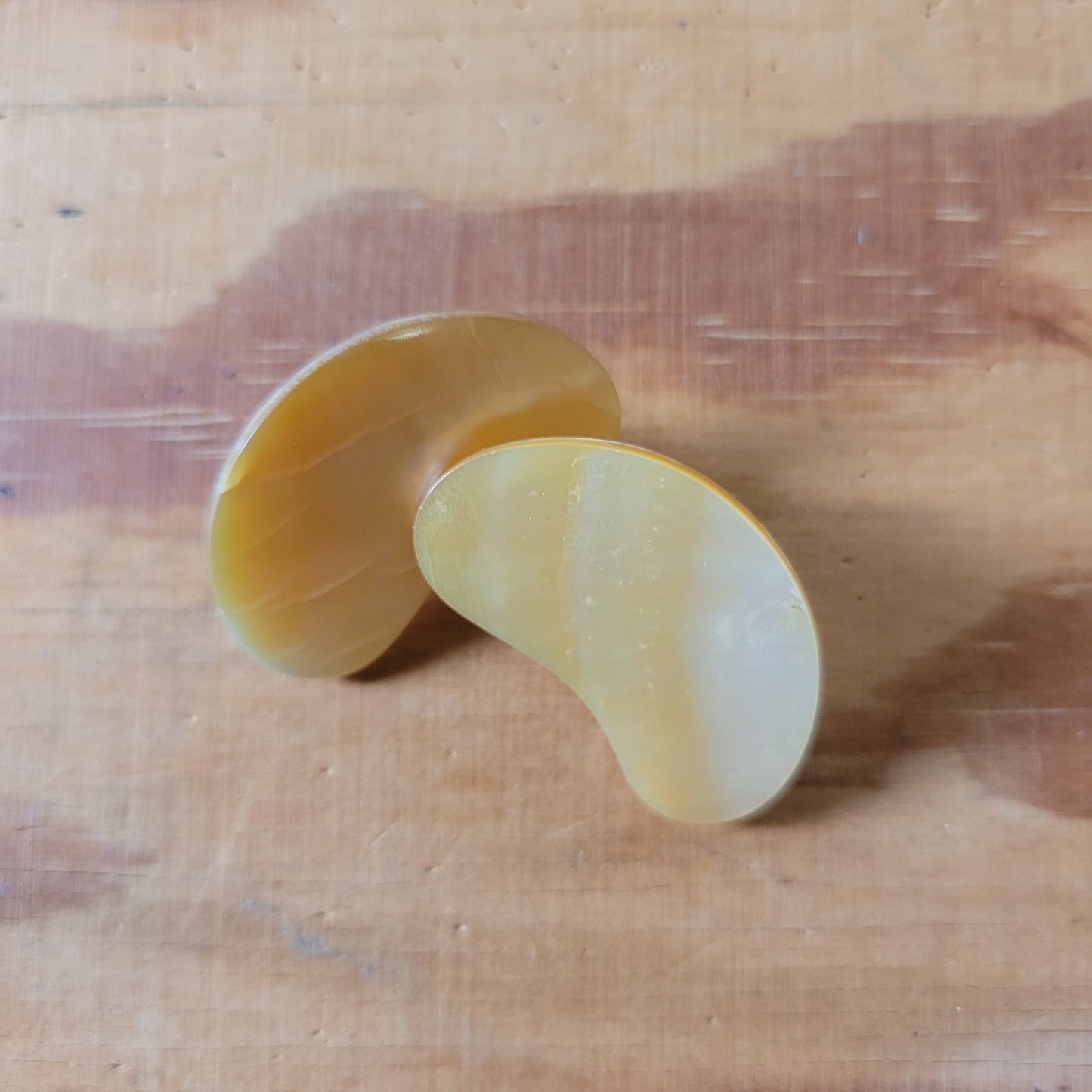 Large 1960s mother of pearl kidney bean shaped flat clip-on earrings