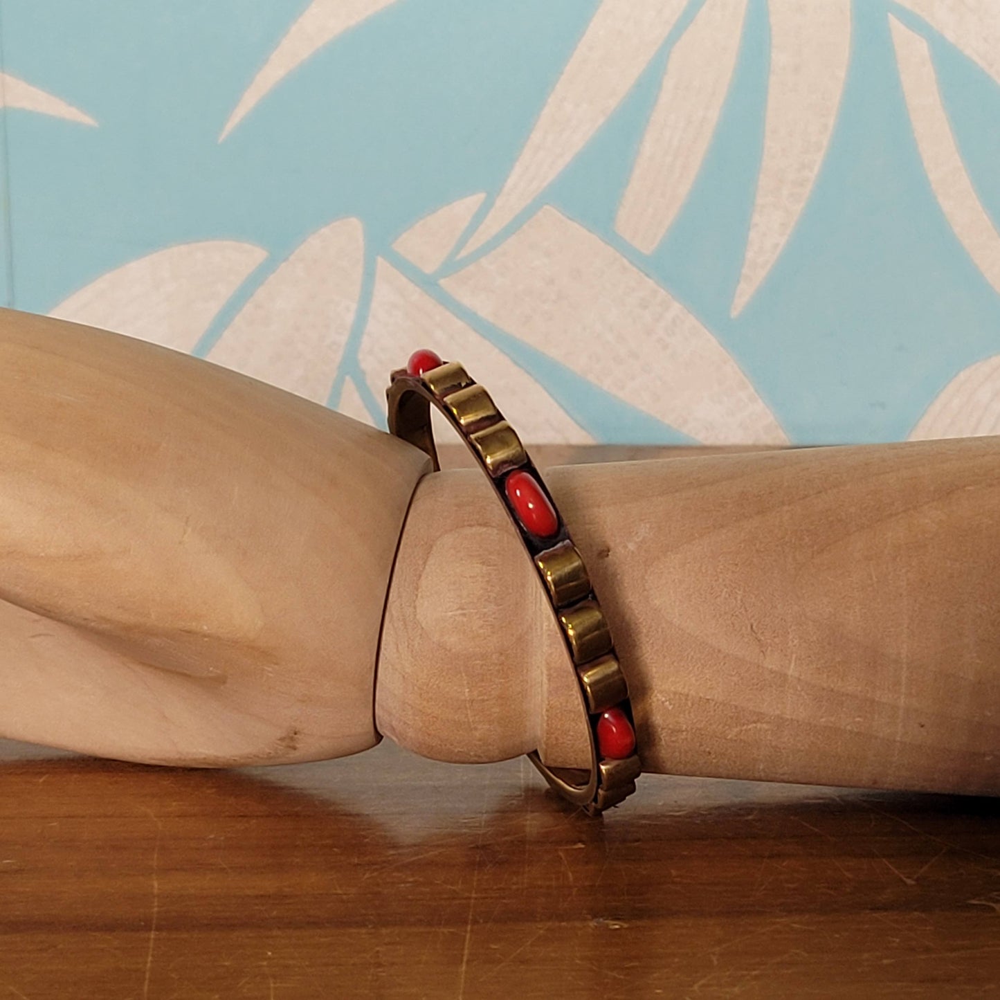1970s/80s Moroccan-style brass bangle with red cabochon detail