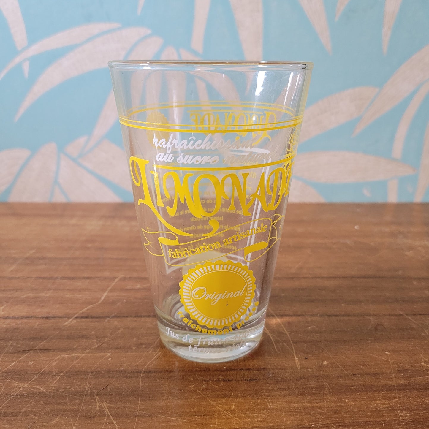 Set of six vintage French 'Limonade Original' yellow lemonade glasses
