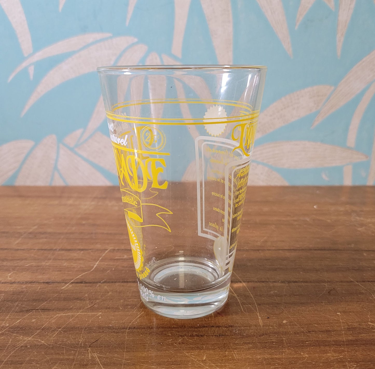 Set of six vintage French 'Limonade Original' yellow lemonade glasses
