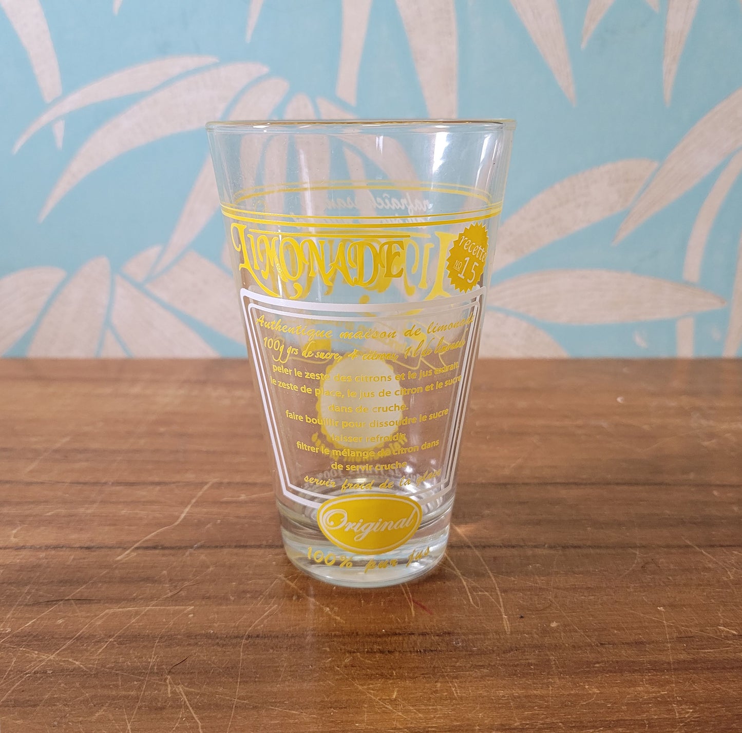 Set of six vintage French 'Limonade Original' yellow lemonade glasses