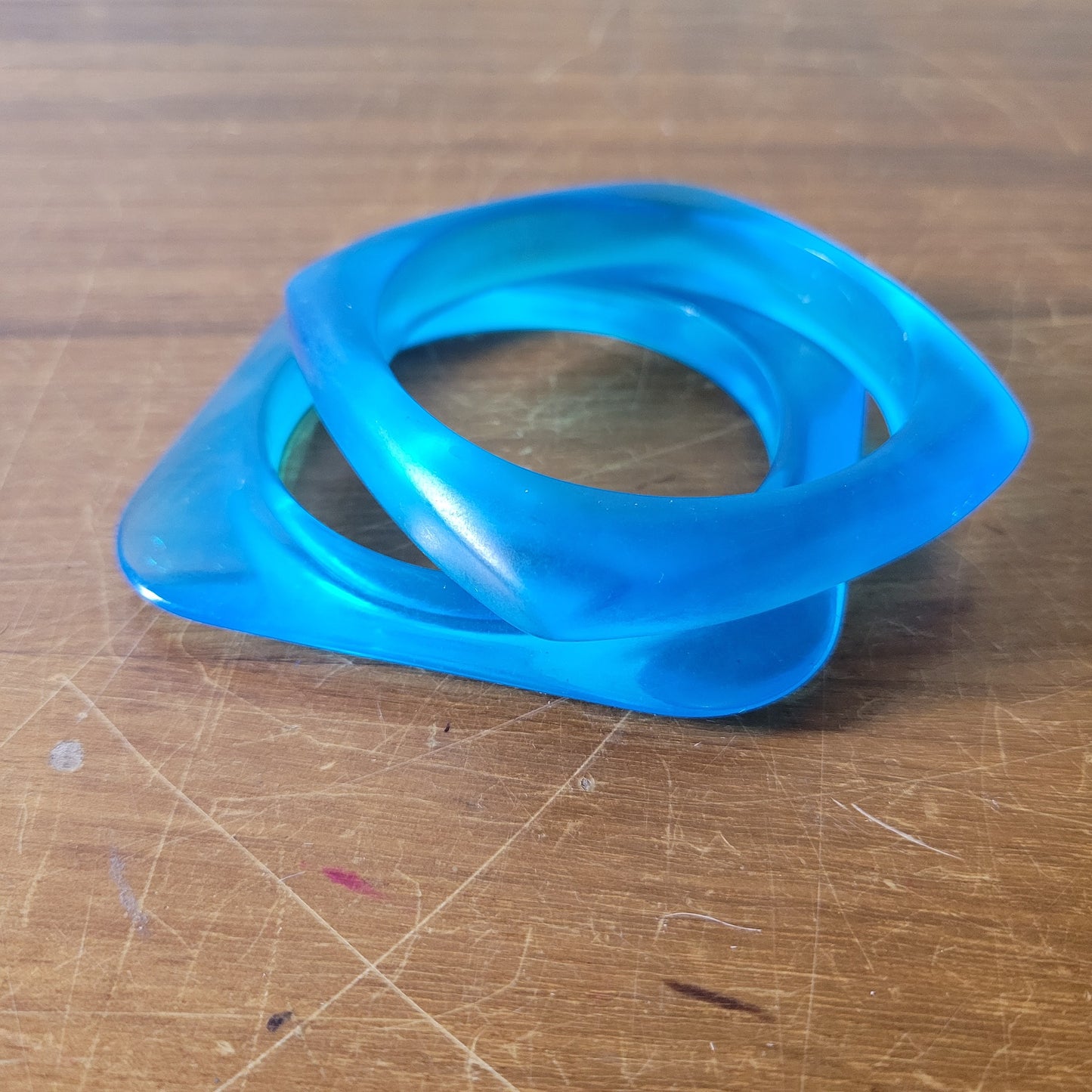 Pair of vintage translucent blue acrylic geometric square bangles
