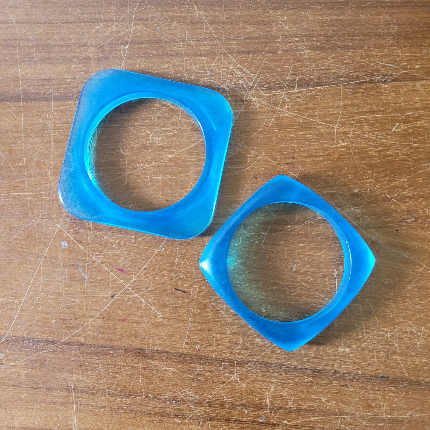 Pair of vintage translucent blue acrylic geometric square bangles