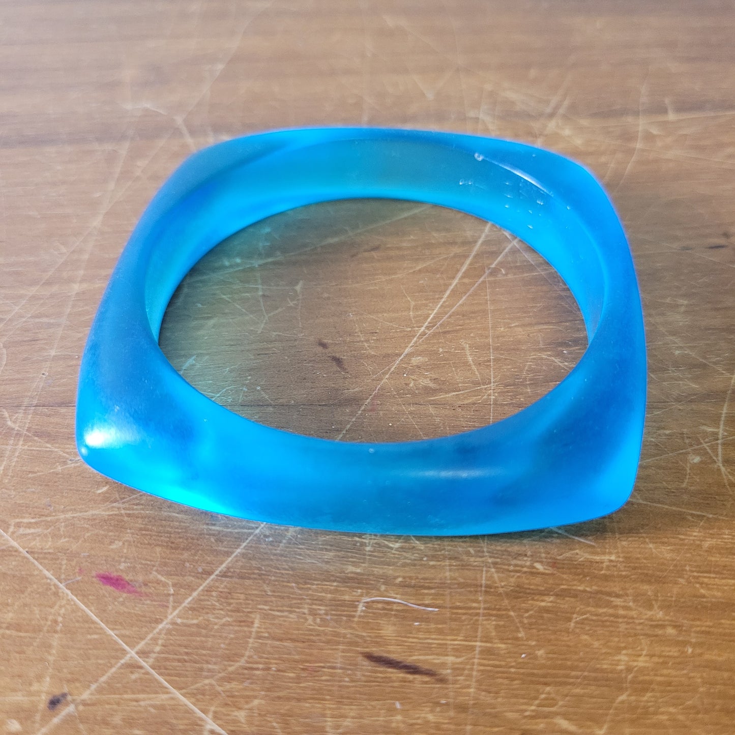 Pair of vintage translucent blue acrylic geometric square bangles