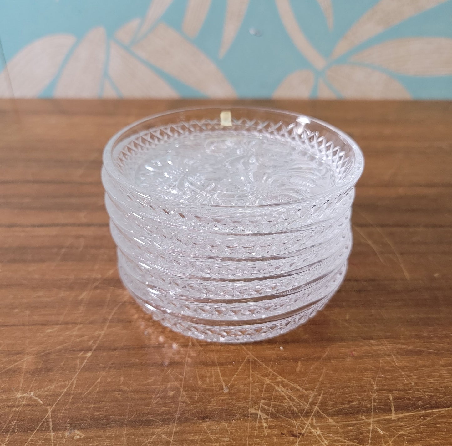 Set of six 1970s/80s Cristal D'Arques lead crystal flower design glass coasters