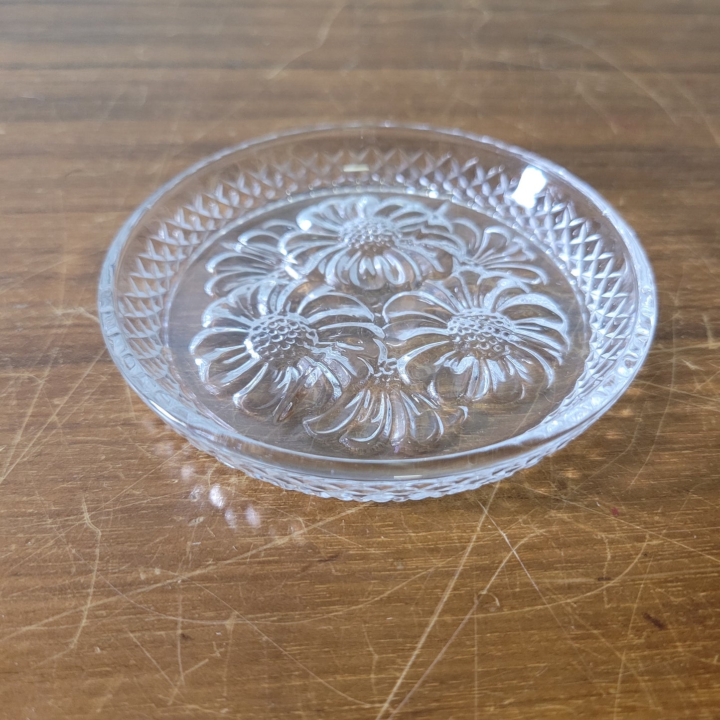 Set of six 1970s/80s Cristal D'Arques lead crystal flower design glass coasters