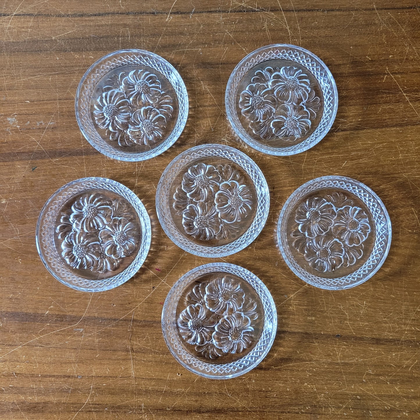 Set of six 1970s/80s Cristal D'Arques lead crystal flower design glass coasters