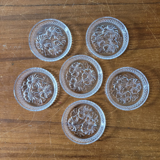 Set of six 1970s/80s Cristal D'Arques lead crystal flower design glass coasters