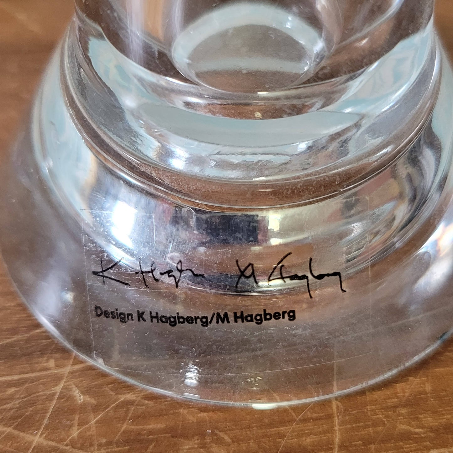 Two collectable Hagberg glass reversible tea light/candle holders