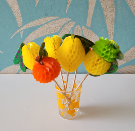 Assortment of retro paper honeycomb fruit cocktail sticks