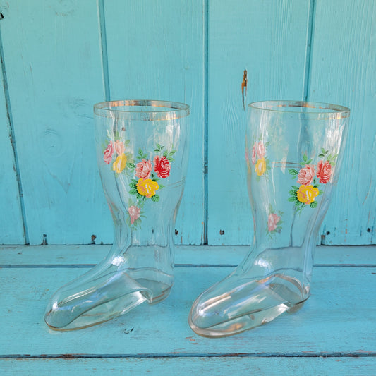 Pair of vintage glass boot vases with floral transfer design