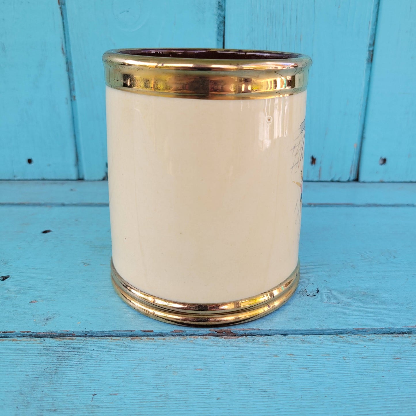 Collectable 1950s Gibsons china tankard with copper gilt edging and football players motif