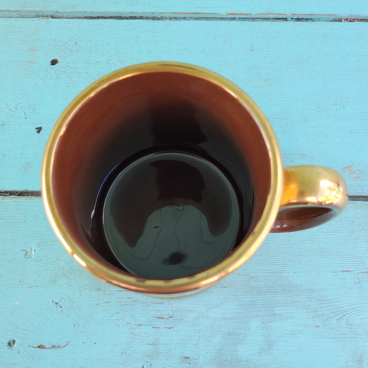 Collectable 1950s Gibsons china tankard with copper gilt edging and football players motif