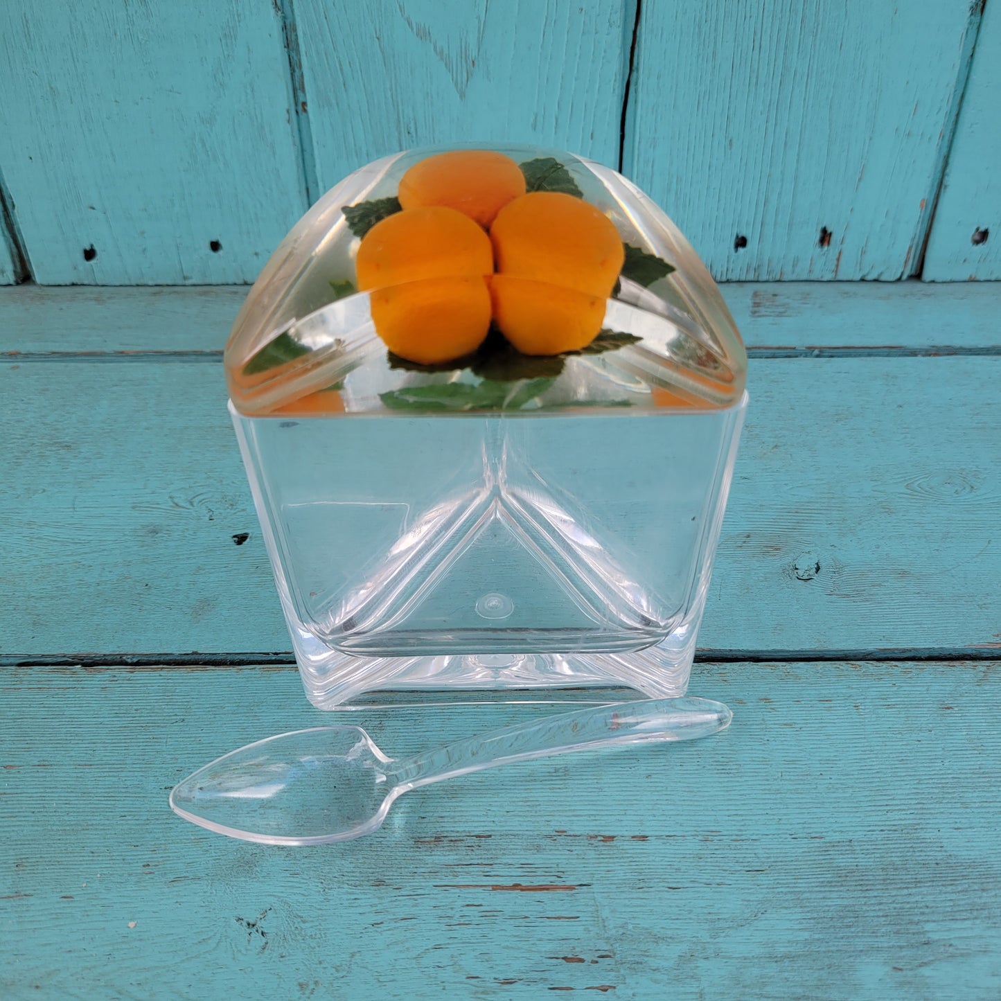 1960s triangular acrylic preserve pot wth fake oranges in lid, and spoon
