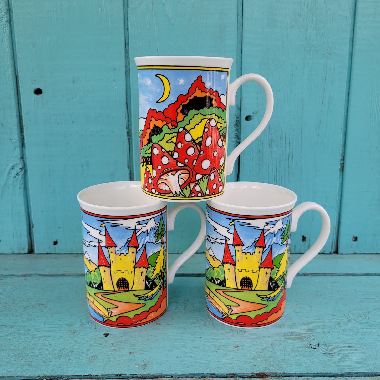Three vintage illustrated Duchess bone china mugs
