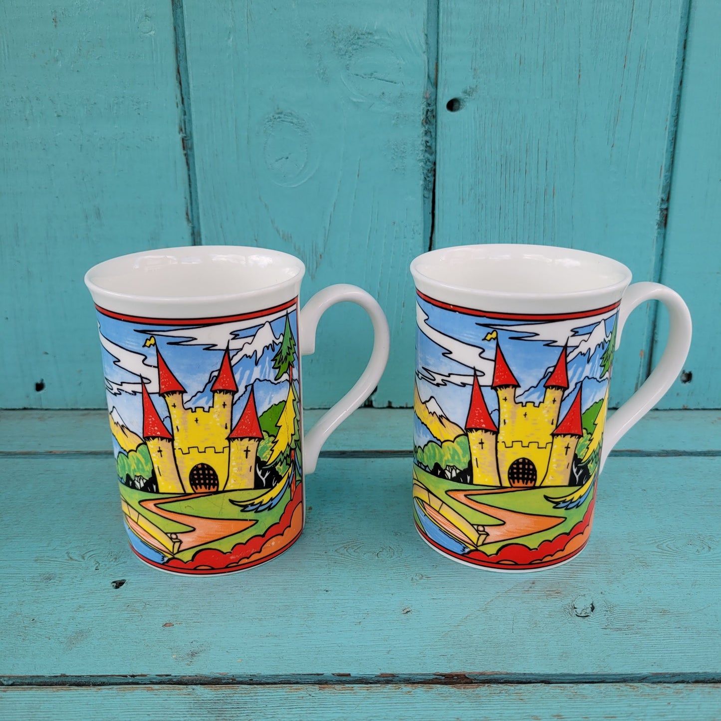 Three vintage illustrated Duchess bone china mugs
