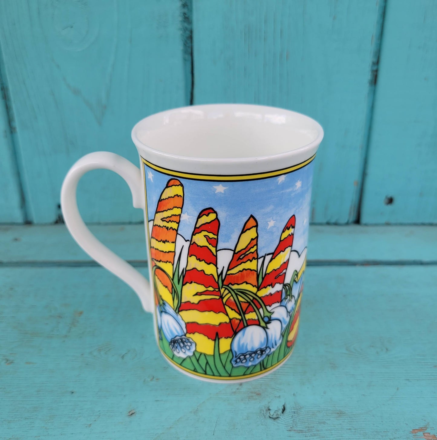 Three vintage illustrated Duchess bone china mugs