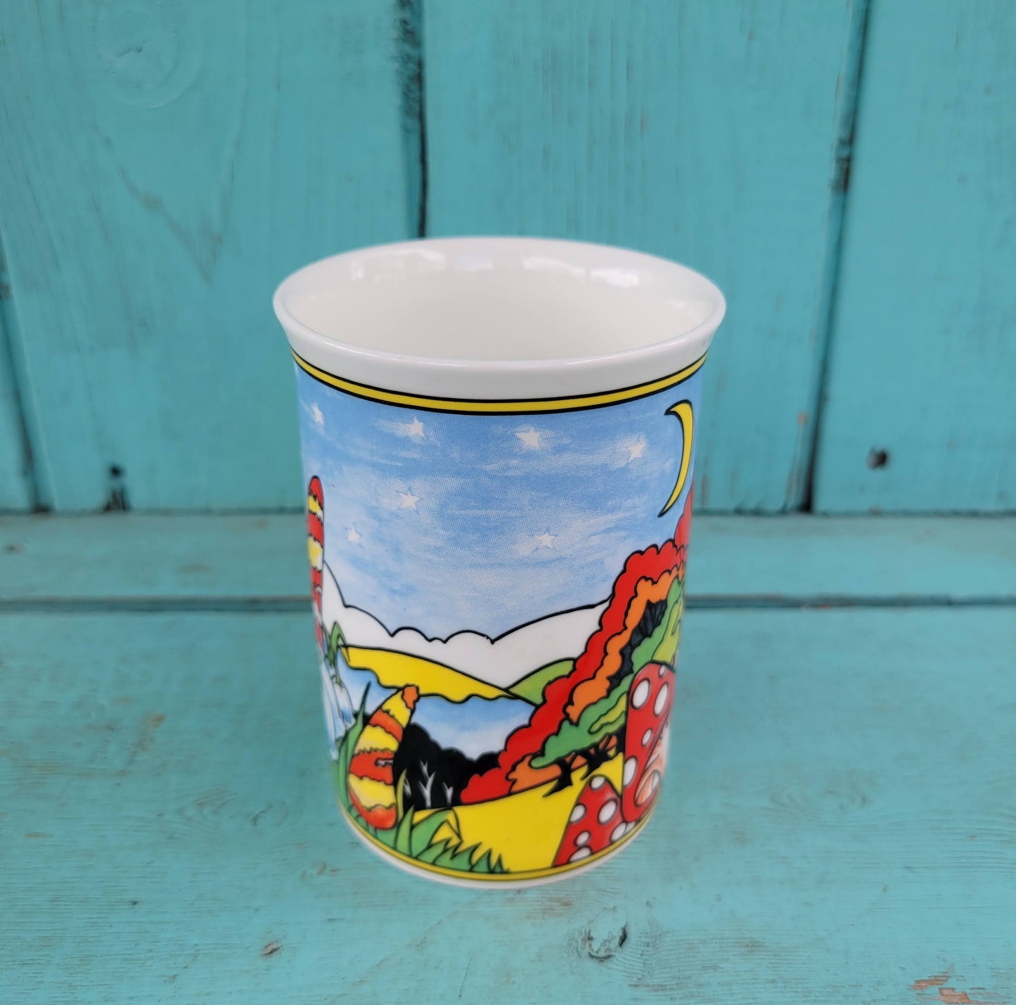 Three vintage illustrated Duchess bone china mugs