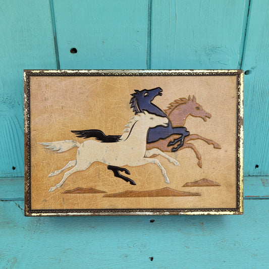 Vintage Chymos, Finland, rectangular candy tin with embossed galloping horses design