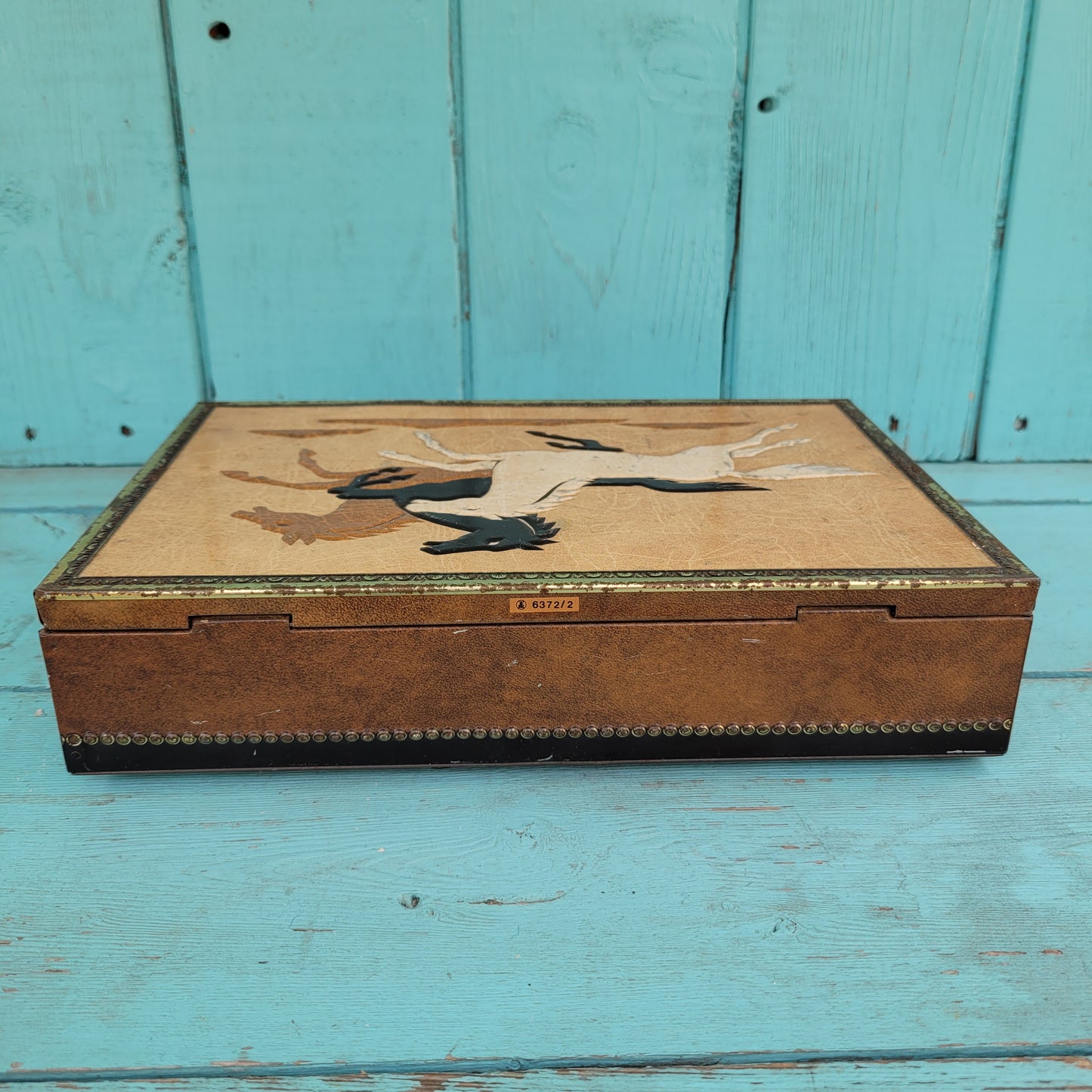 Vintage Chymos, Finland, rectangular candy tin with embossed galloping horses design