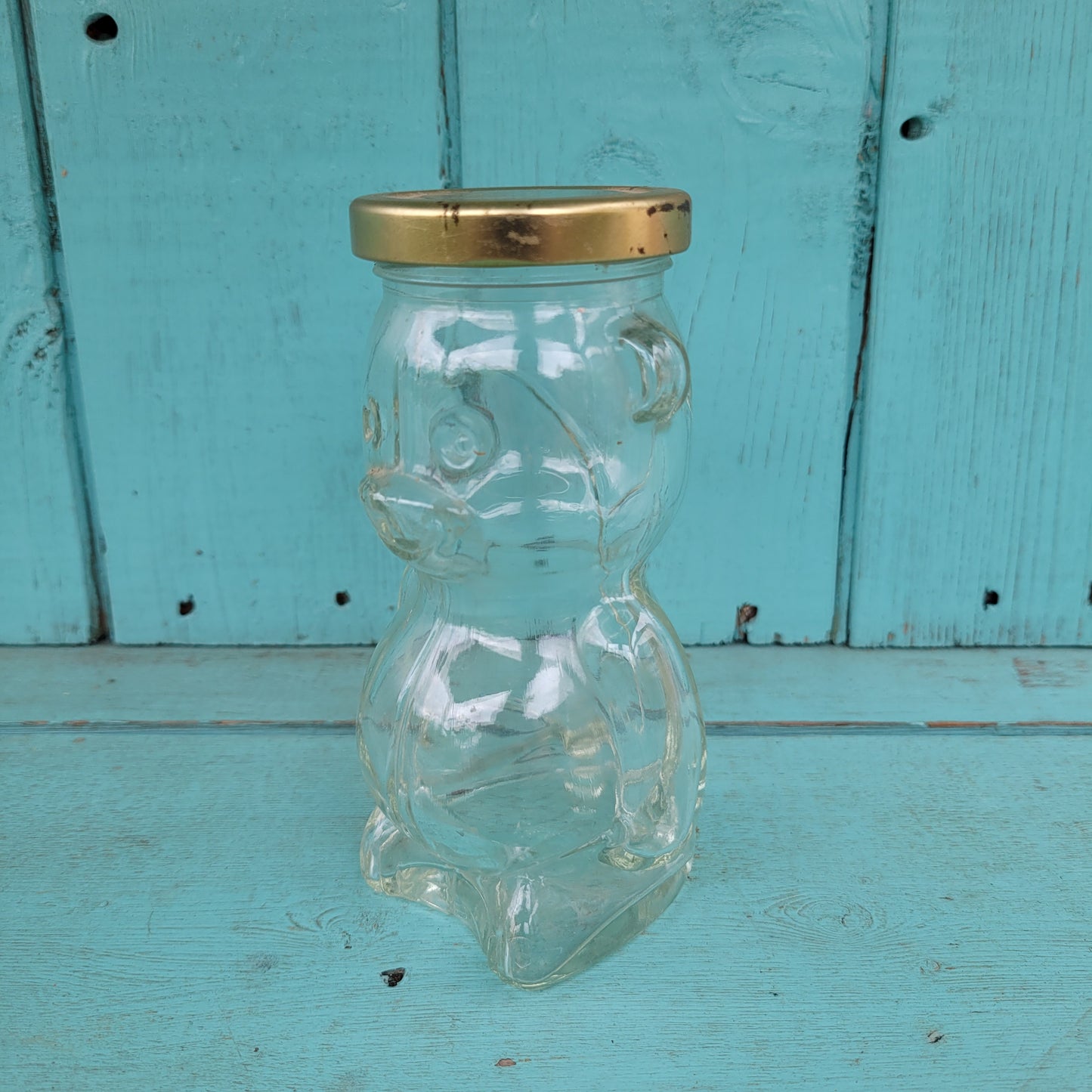 circa. 1980s glass teddy bear-shaped honey jar