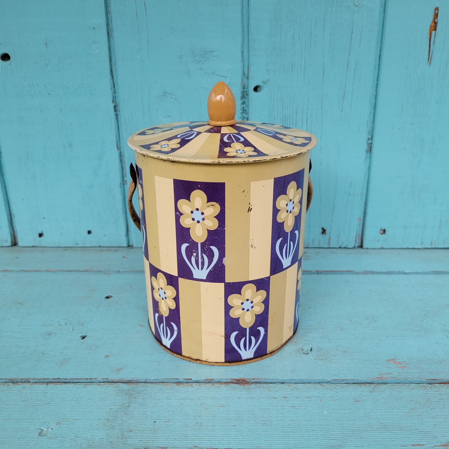 1960s/70s taupe/navy flower motif biscuit tin