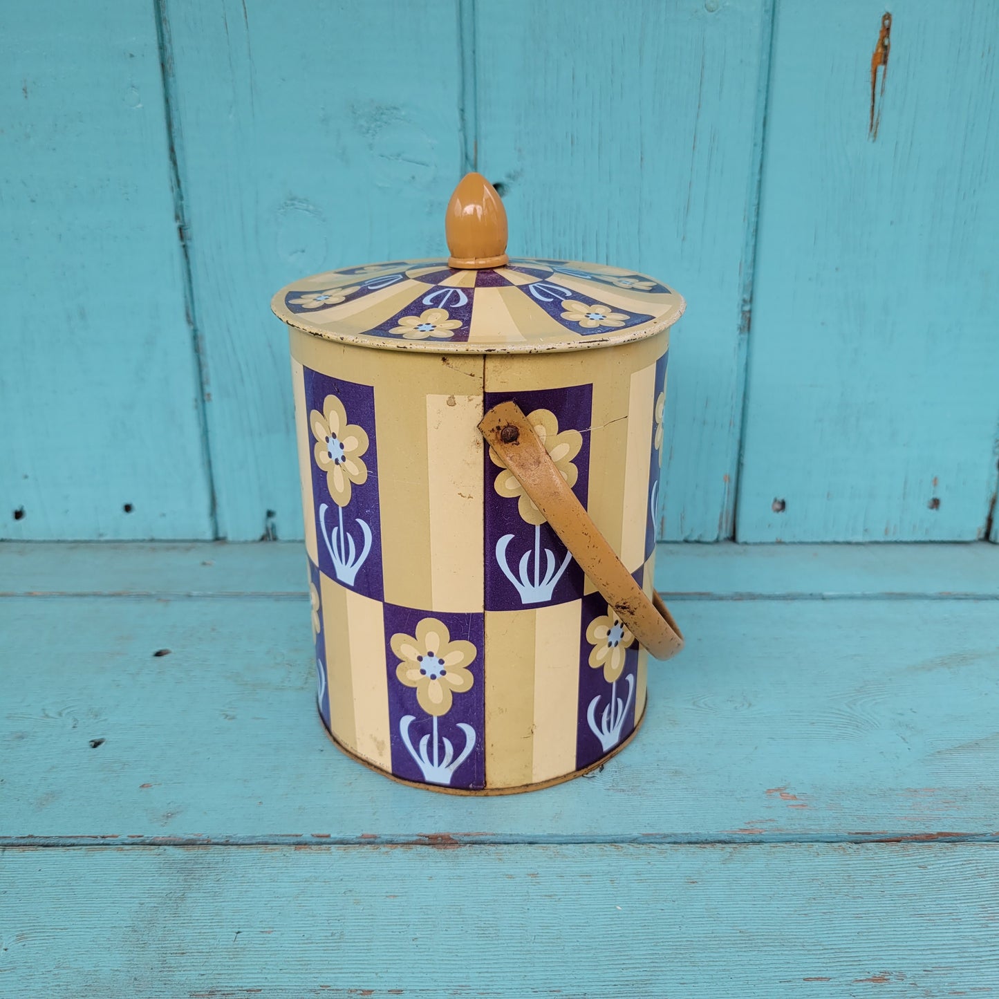 1960s/70s taupe/navy flower motif biscuit tin
