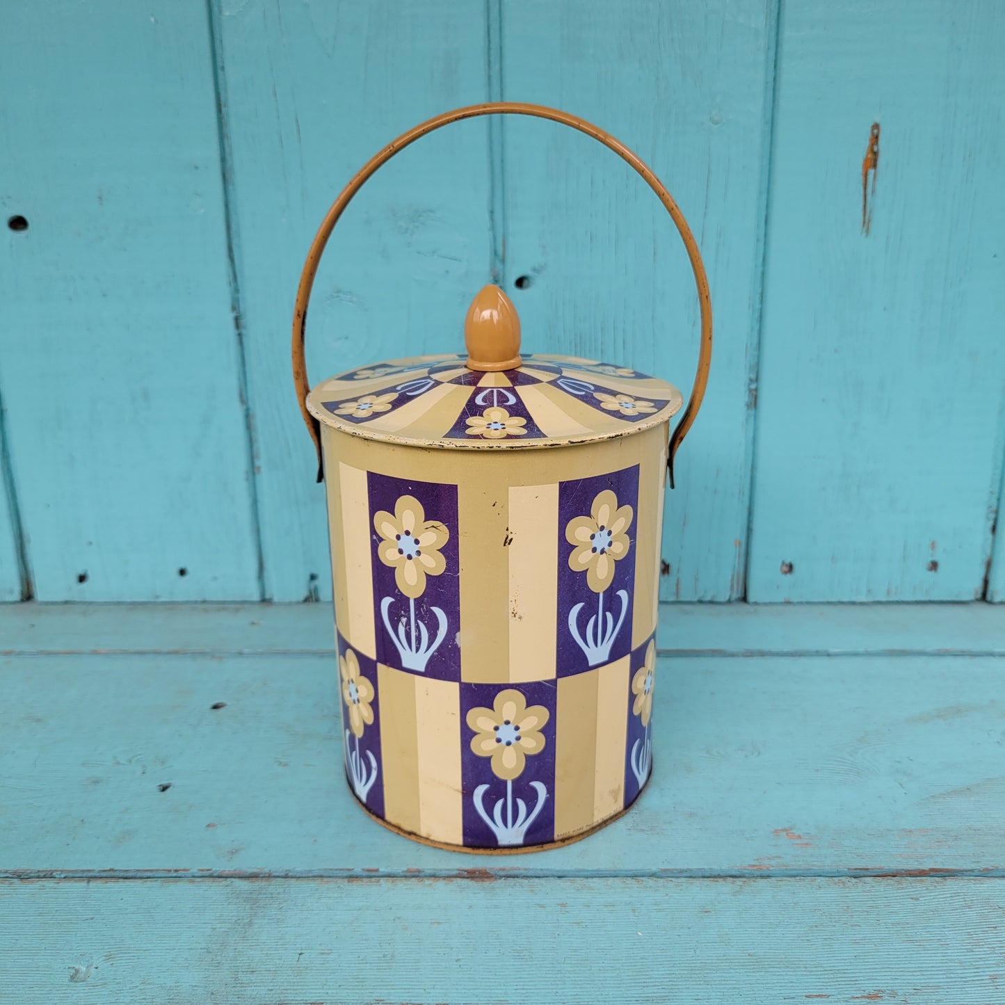 1960s/70s taupe/navy flower motif biscuit tin