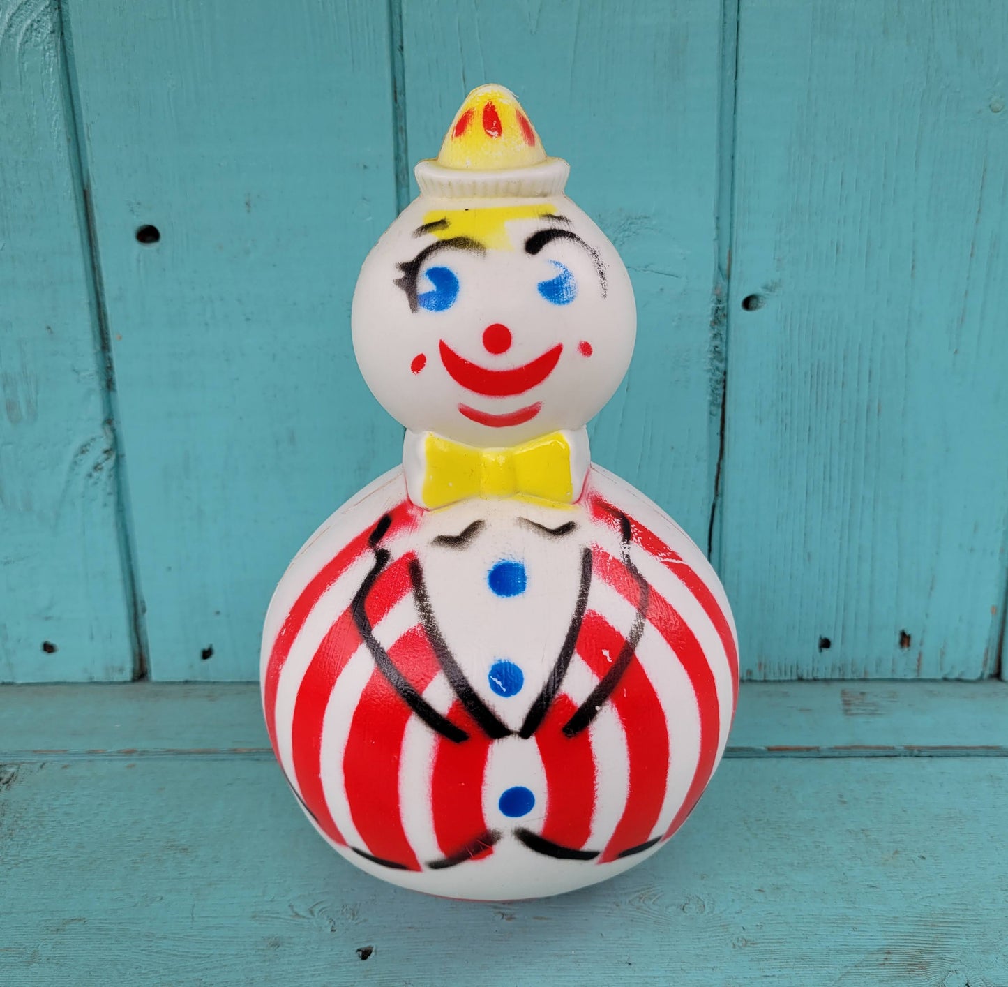 1950s Roly Poly hard plastic musical wobble clown