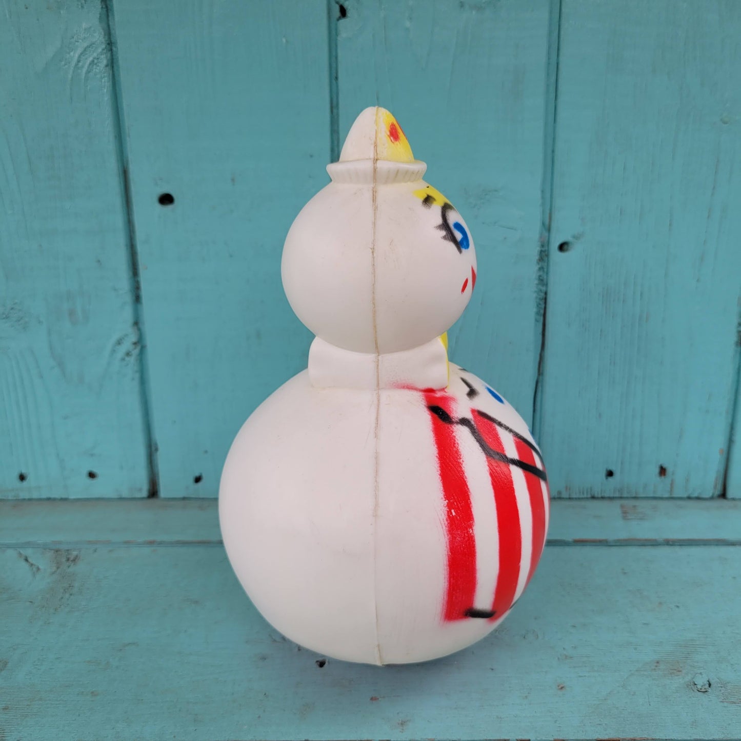 1950s Roly Poly hard plastic musical wobble clown