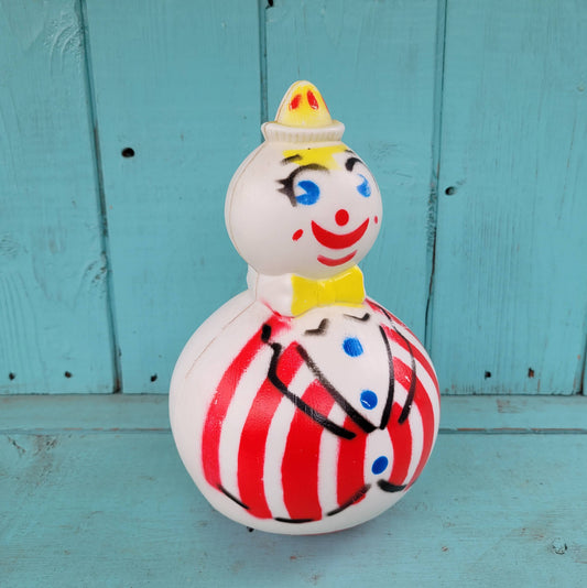 1950s Roly Poly hard plastic musical wobble clown