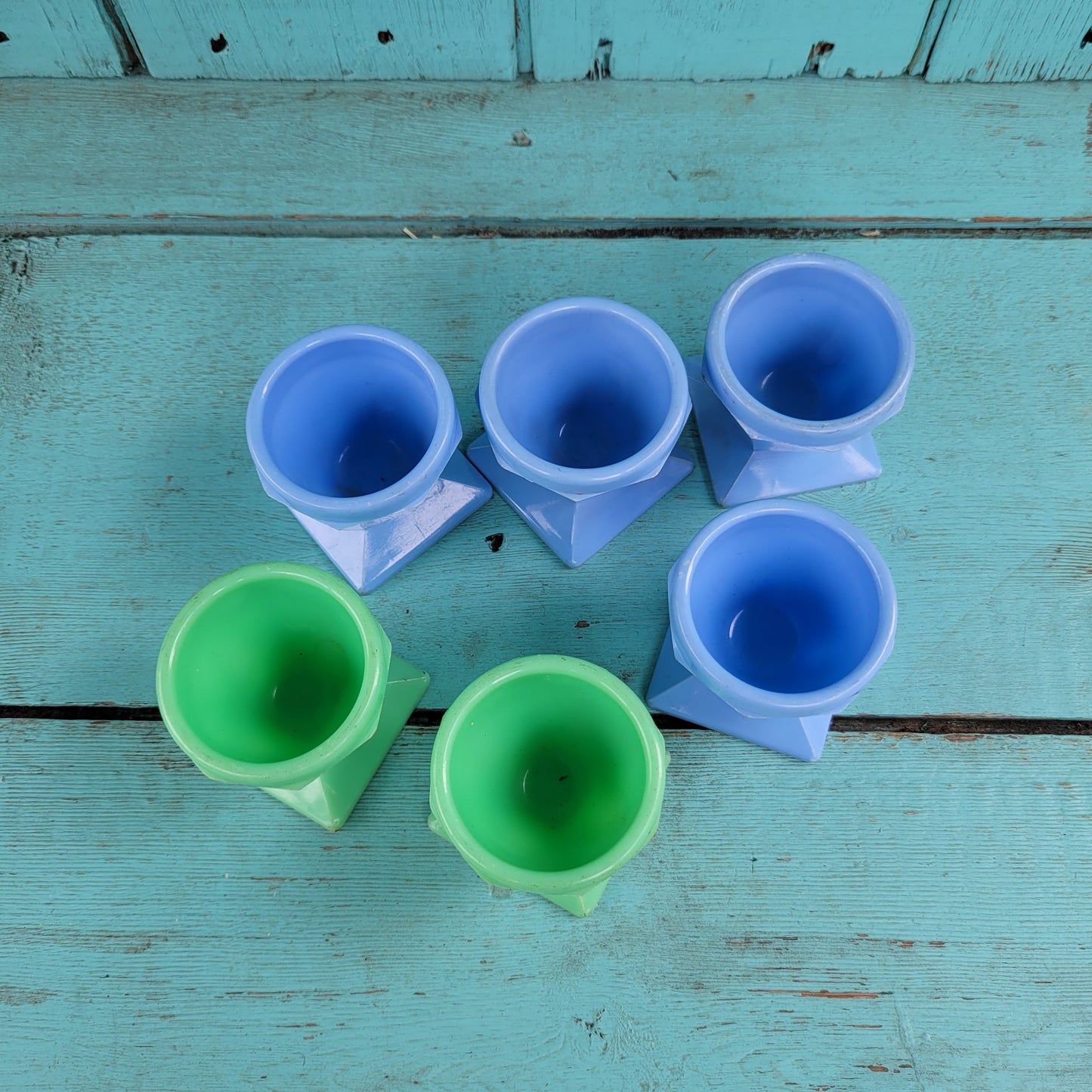 Six 1950s Tudor Rose green, & blue plastic egg cups