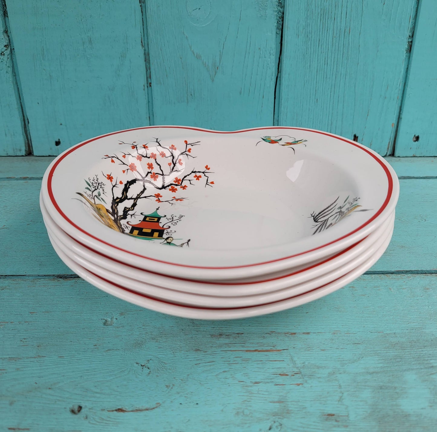 Four rare mid-century Barratt's Delphatic White heart shaped bowls