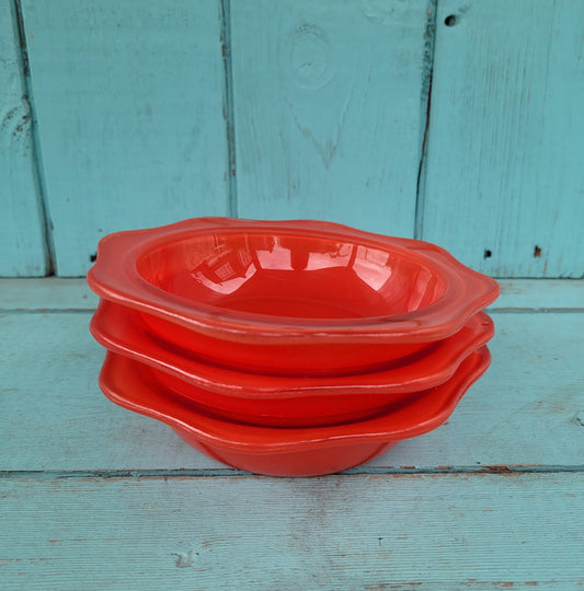 Three 1950s/60s red Pyrex fluted glass dessert bowls
