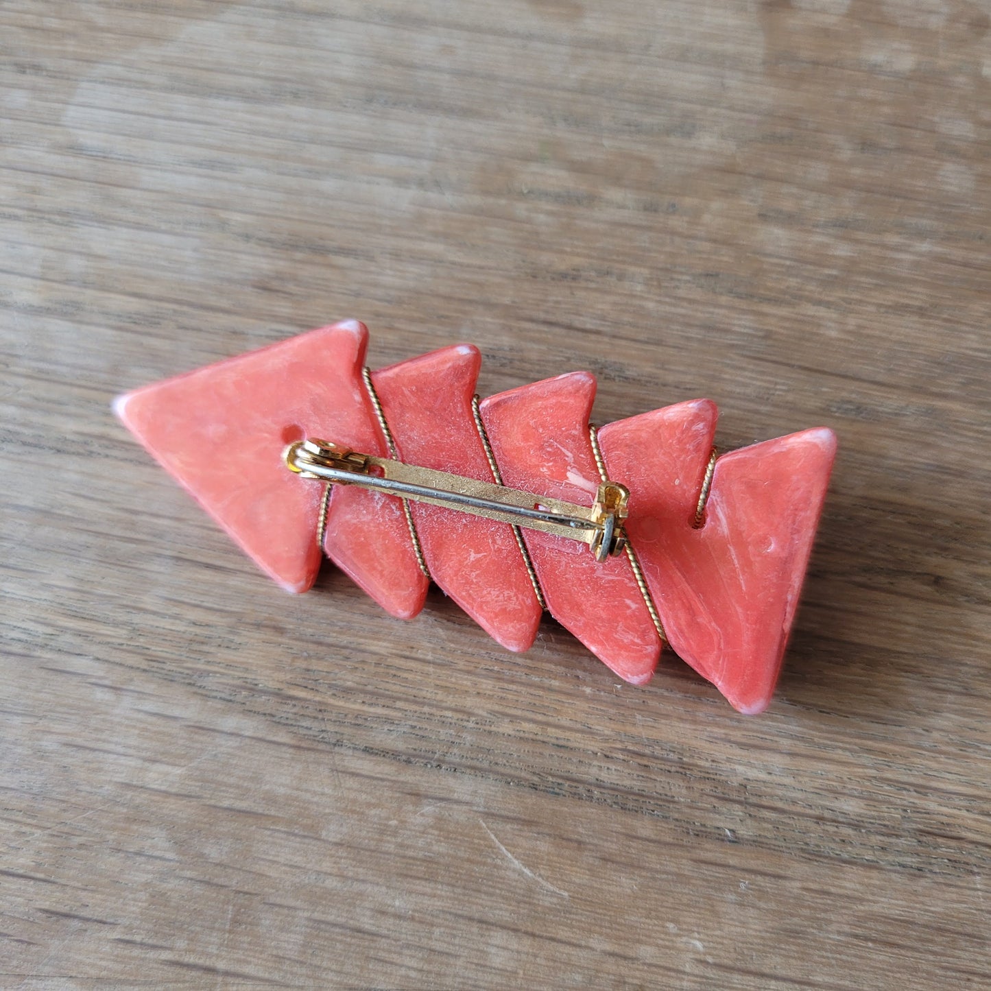 1960s coral-pink geometric acrylic brooch
