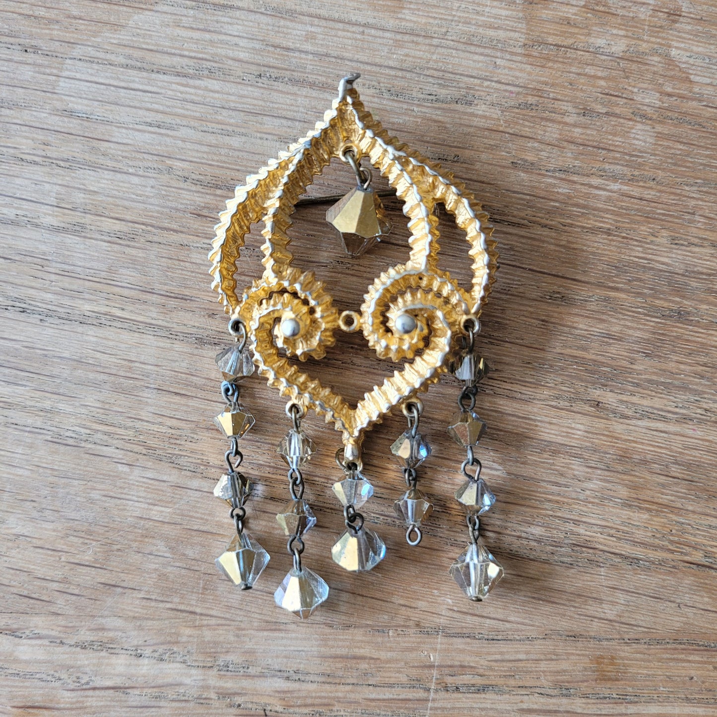 1960s/70s gold-tone filigree chandelier brooch with faceted crystal drops