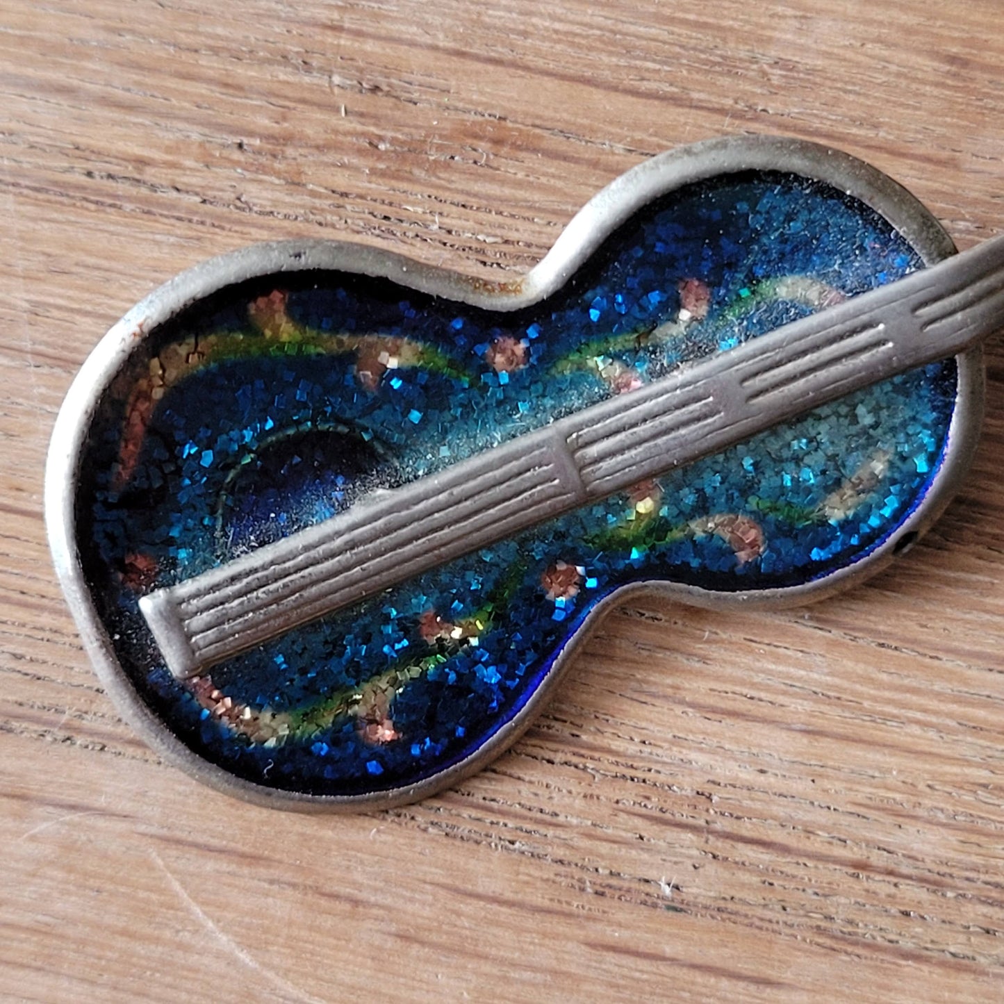 1970s  silver-tone pot metal & blue glitter enamel guitar brooch pin