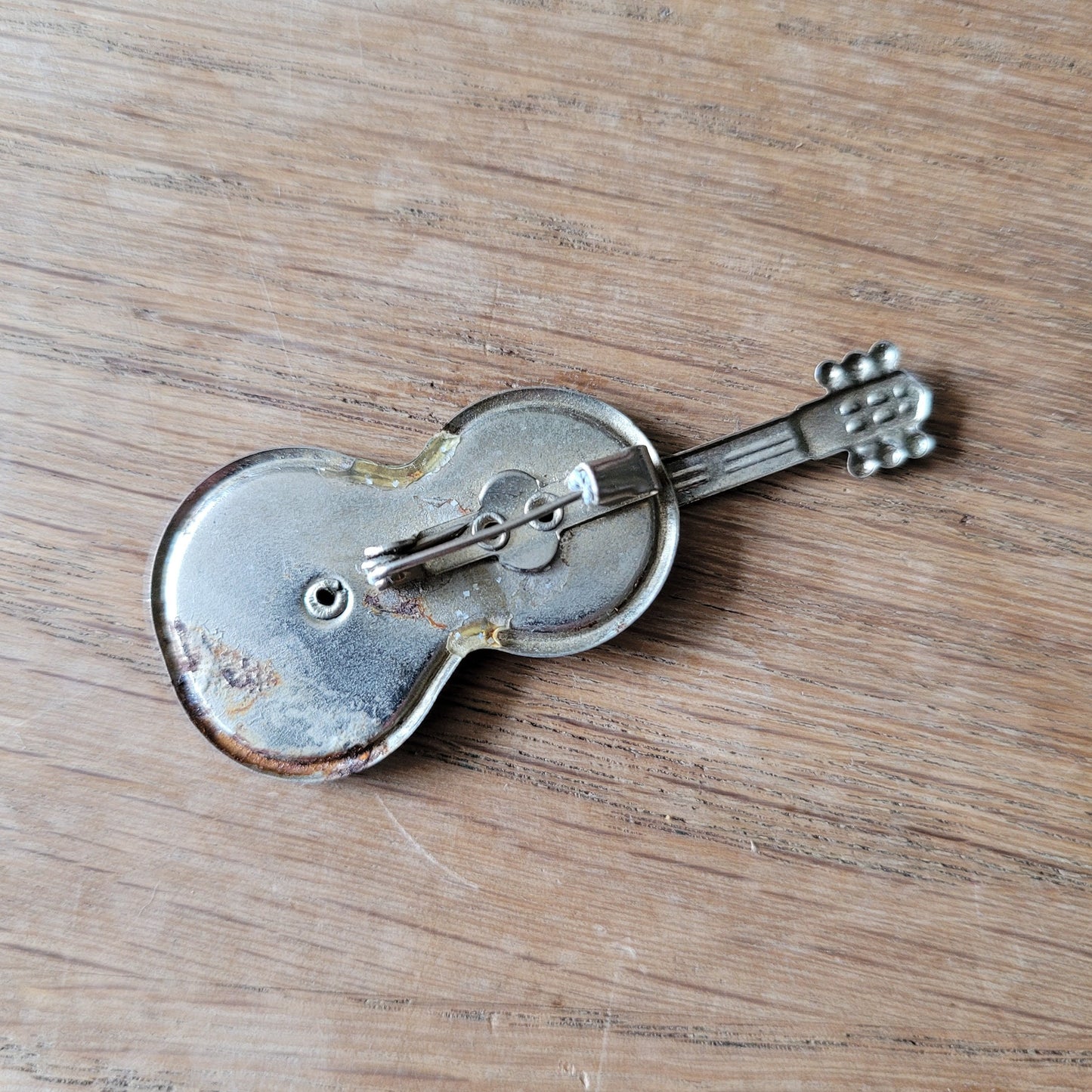 1970s  silver-tone pot metal & blue glitter enamel guitar brooch pin
