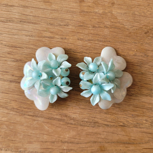 1960s blue floral plastic cluster & iridescent backing clip-on earrings