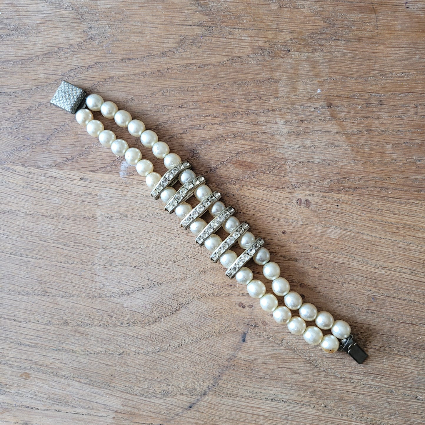 Vintage double strand faux pearl bracelet with rhinestone detailing