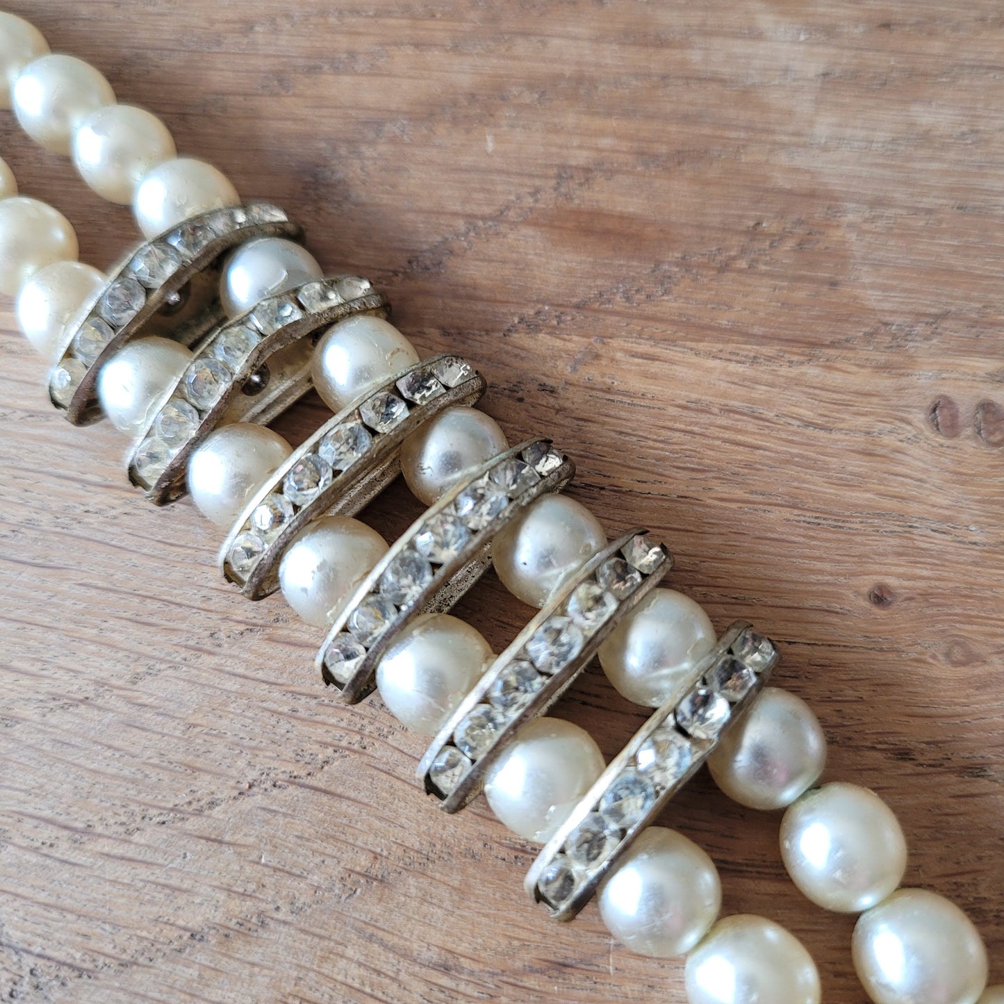 Vintage double strand faux pearl bracelet with rhinestone detailing