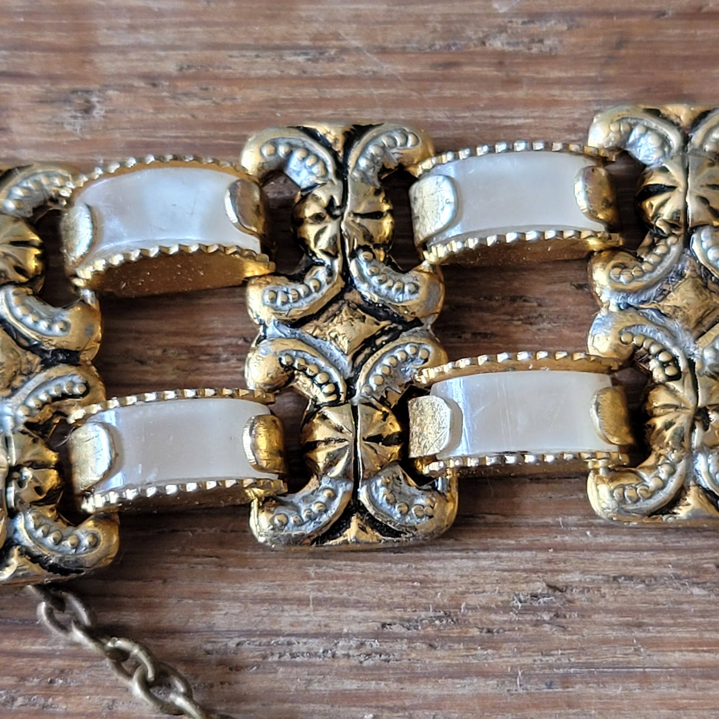 1950s/60s gold-tone ornate link bracelet with lucite panels & safety chain