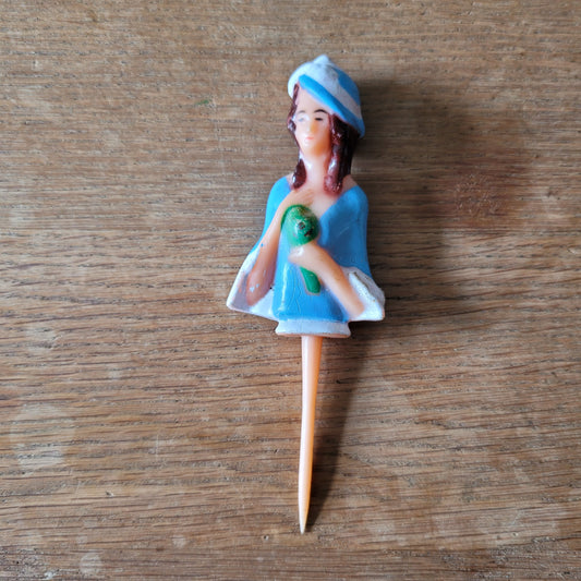 Vintage celluloid lady cake topper