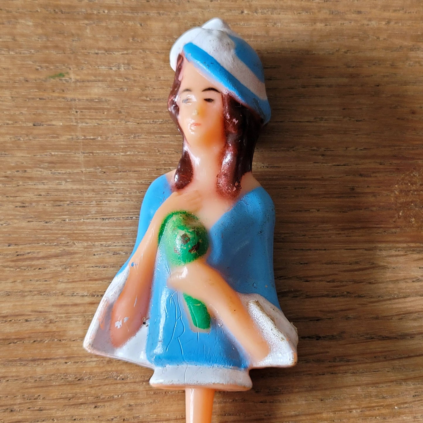 Vintage celluloid lady cake topper