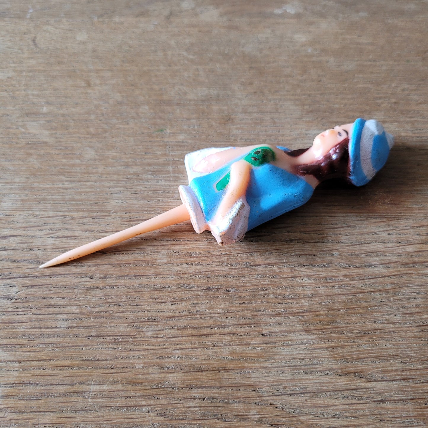 Vintage celluloid lady cake topper