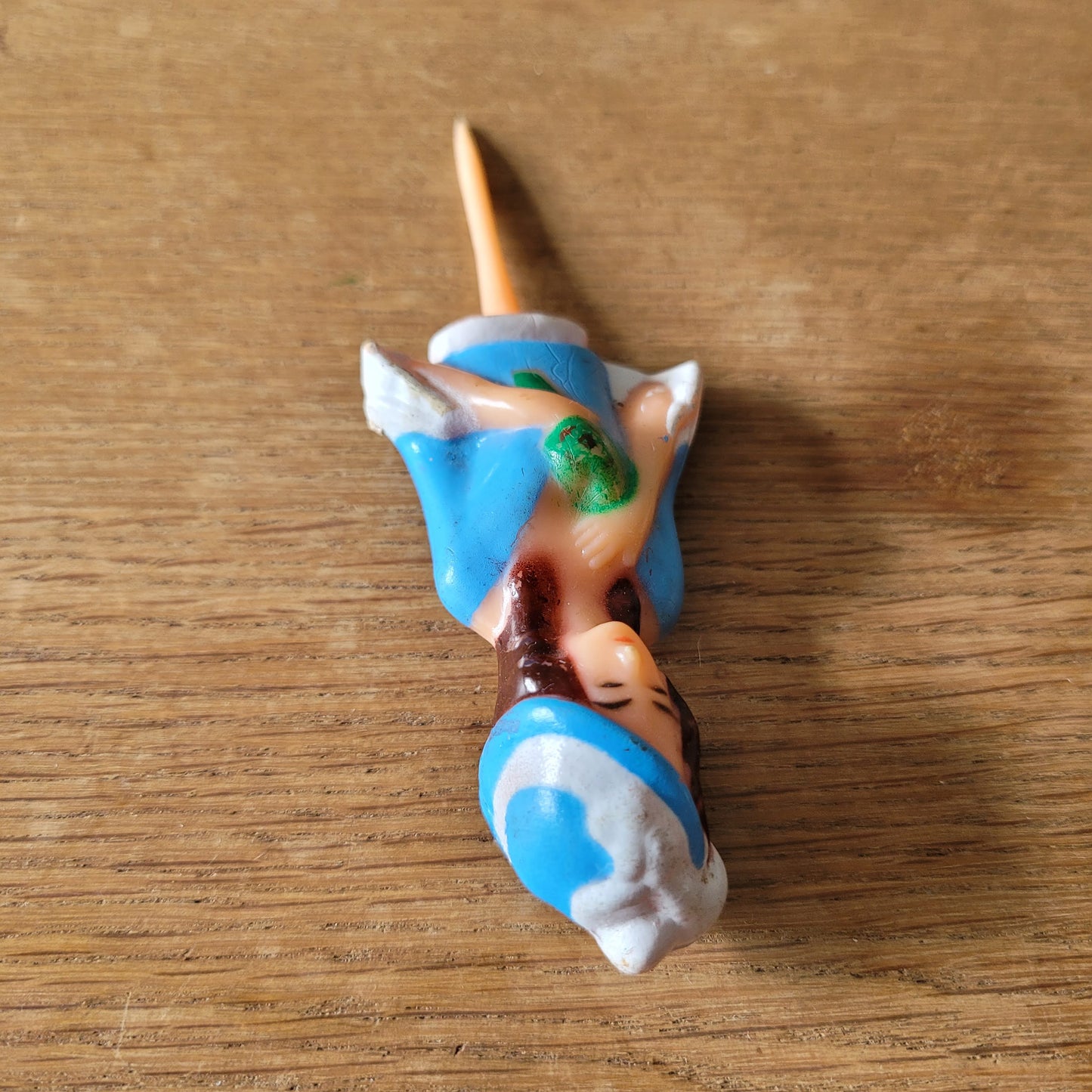 Vintage celluloid lady cake topper