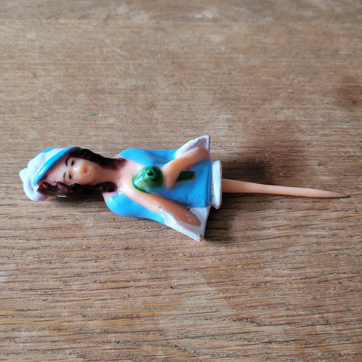 Vintage celluloid lady cake topper